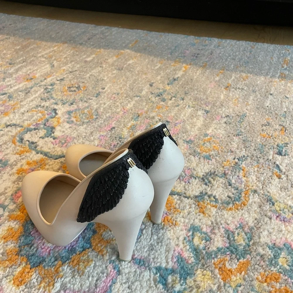 Melissa Vivienne Westwood Cream Heels with Black Glitter Wing Accent - Picture 1 of 4